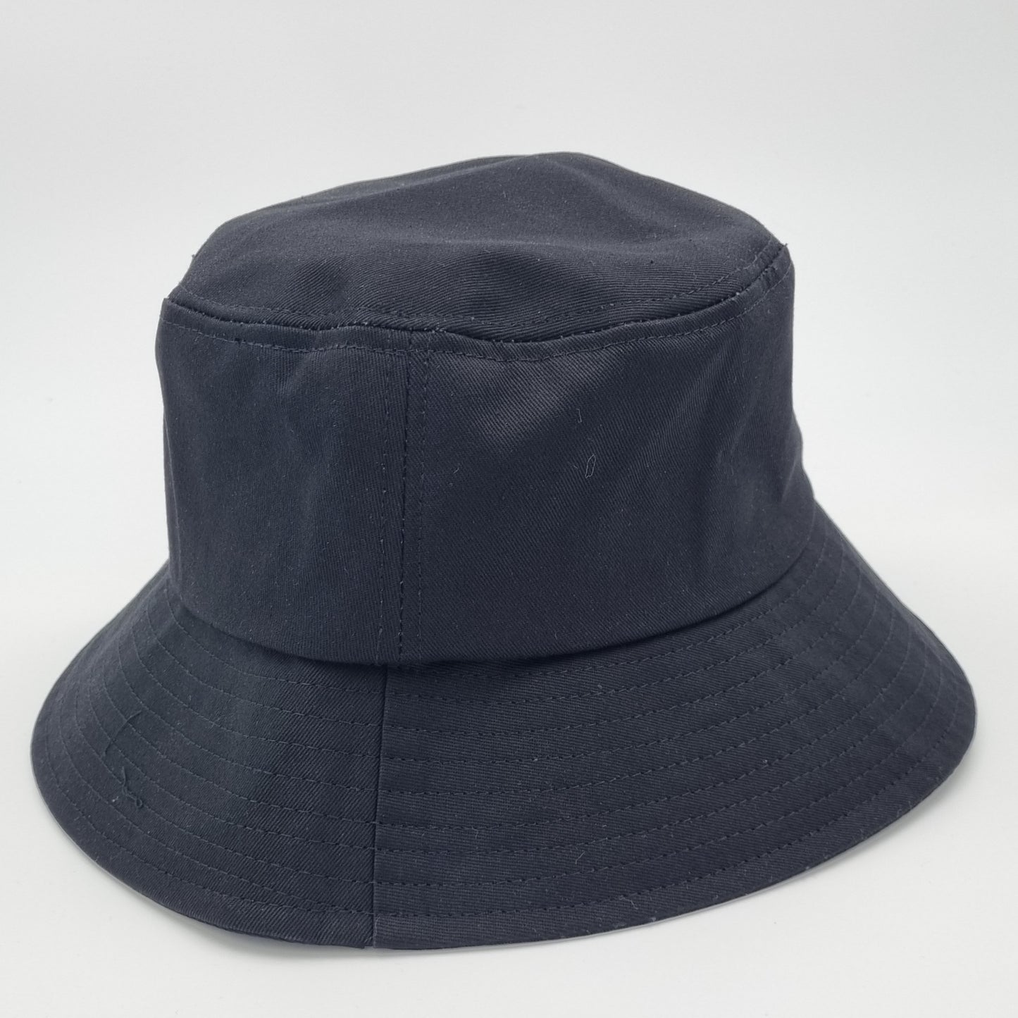 Black EMF bucket hat with silver fabric lining for EMF protection, offering a stylish and comfortable fit while shielding against electromagnetic radiation