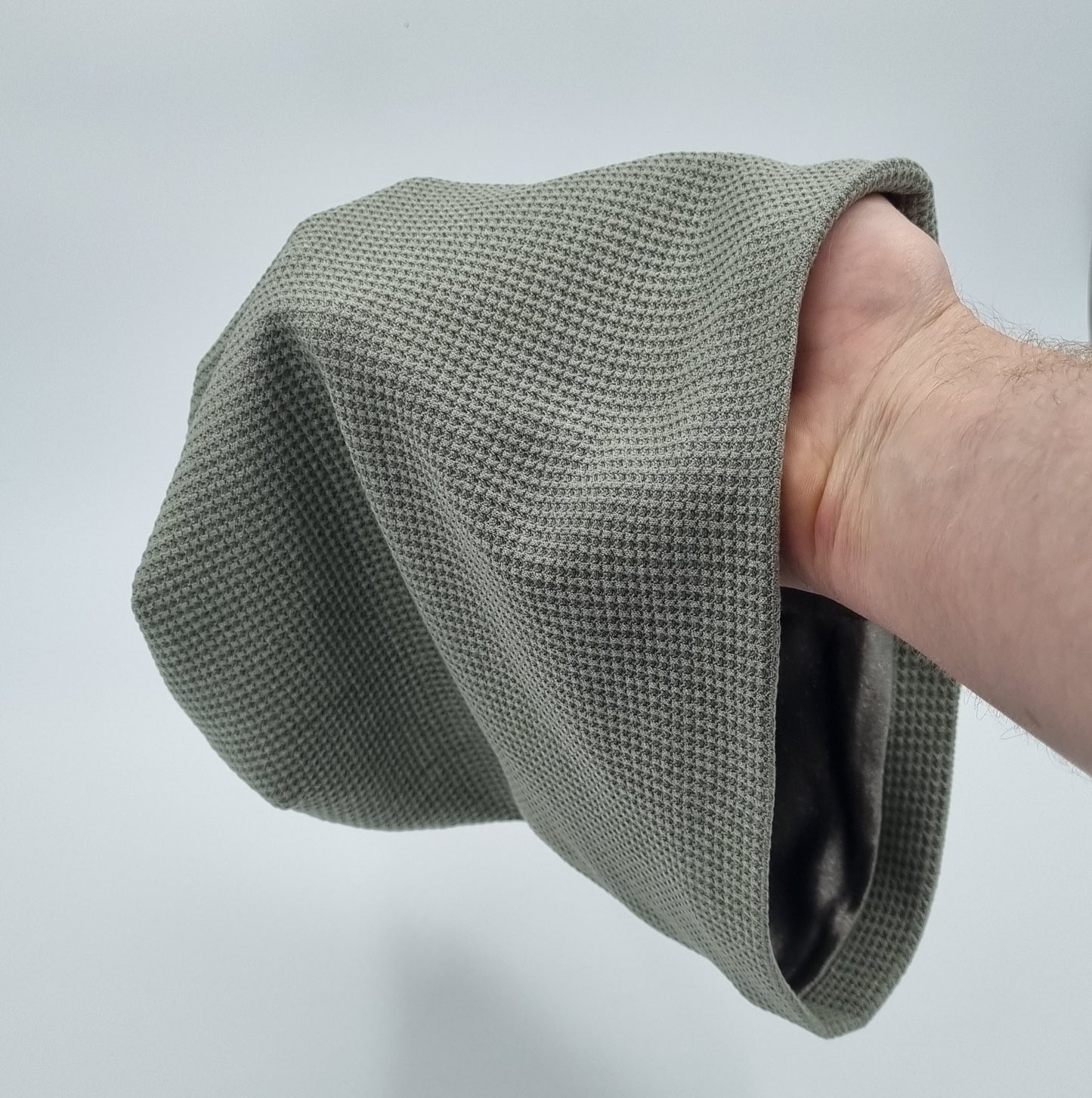 Khaki EMF slouch beanie with silver thread lining, lightweight and relaxed fit for mild weather or indoor use