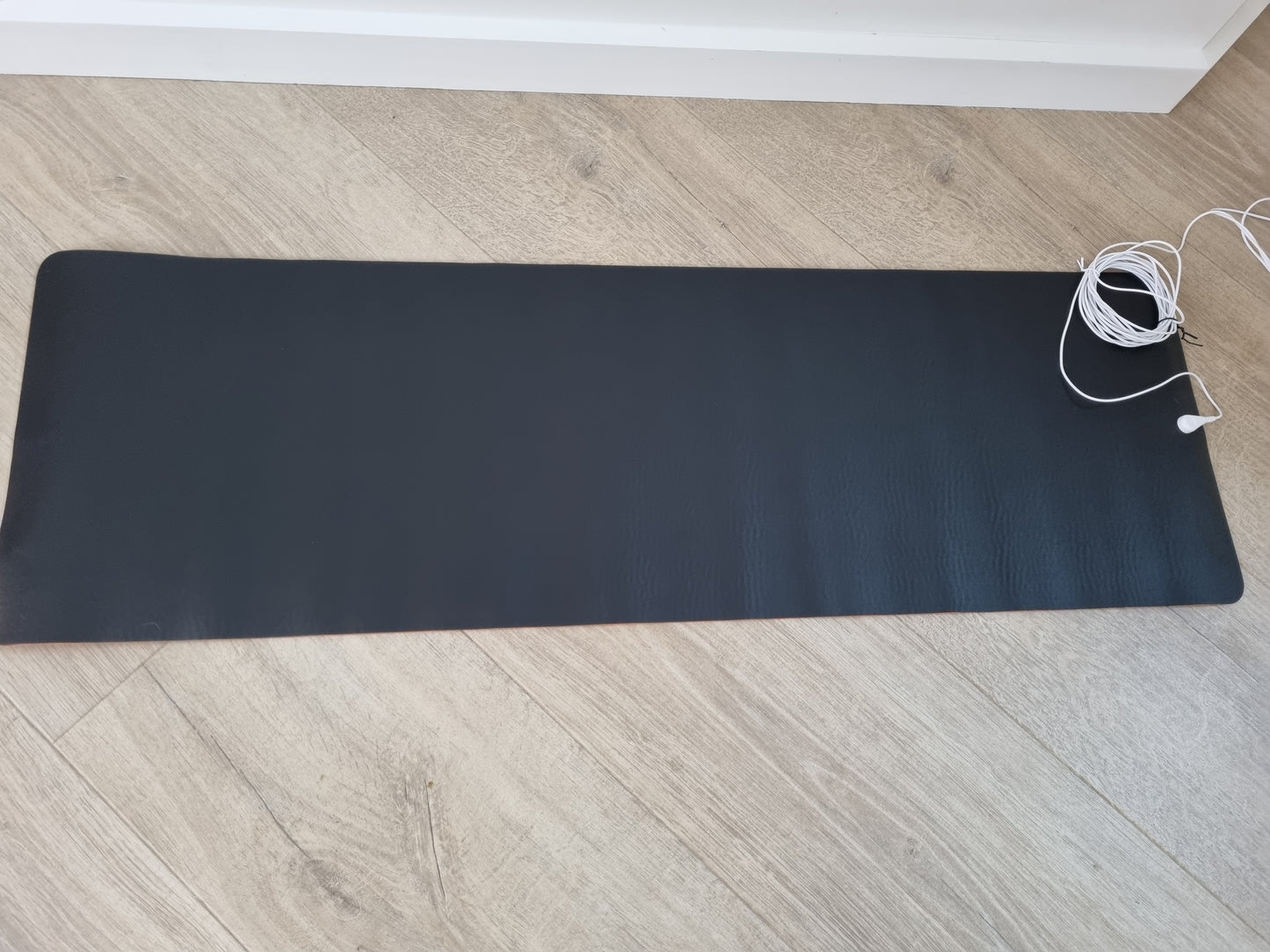 Durable EVA grounding mat designed for indoor use, helps reduce electrical charge buildup and improve wellness through grounding